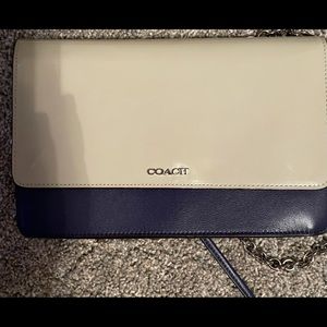 Coach crossbody purse. Like new condition. Gold chain w/thin,navy leather strap.